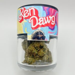 An eighth of the THCA strain Ken Dawg in a glass jar.