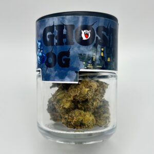 An eighth of the THCA flower Ghost OG in a glass jar.